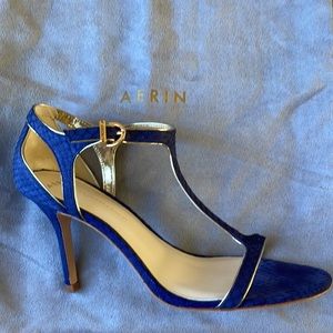 Beautiful Aerin heels with gold detail.  Size 8.
